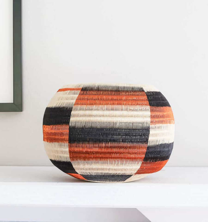 Copper And Black Wide Steps – geometric motif – woven basket – baskets – handwoven in Colombia