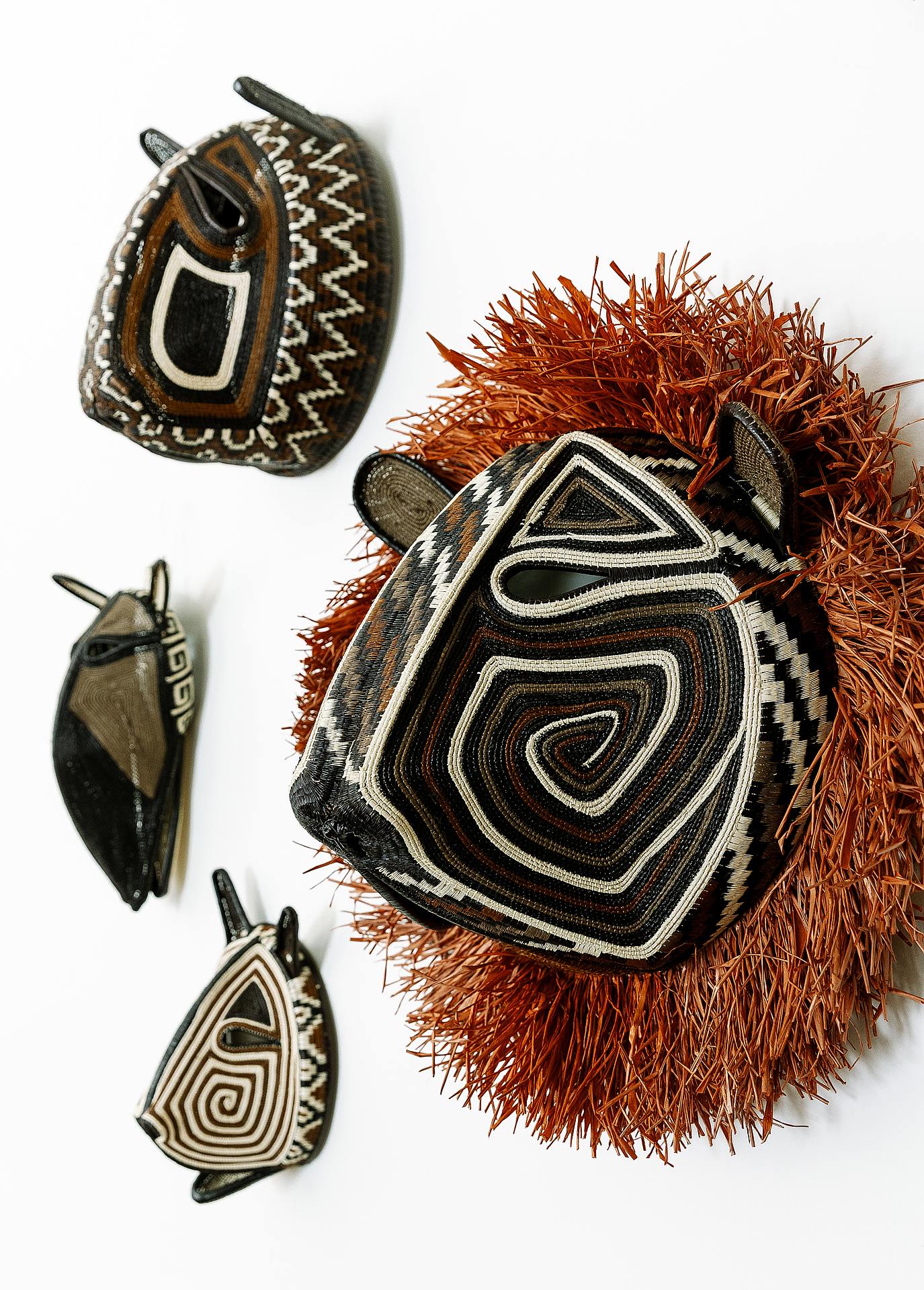 Embera woven animal mask featuring the jaguar cat design, handwoven with natural dyes from Panama