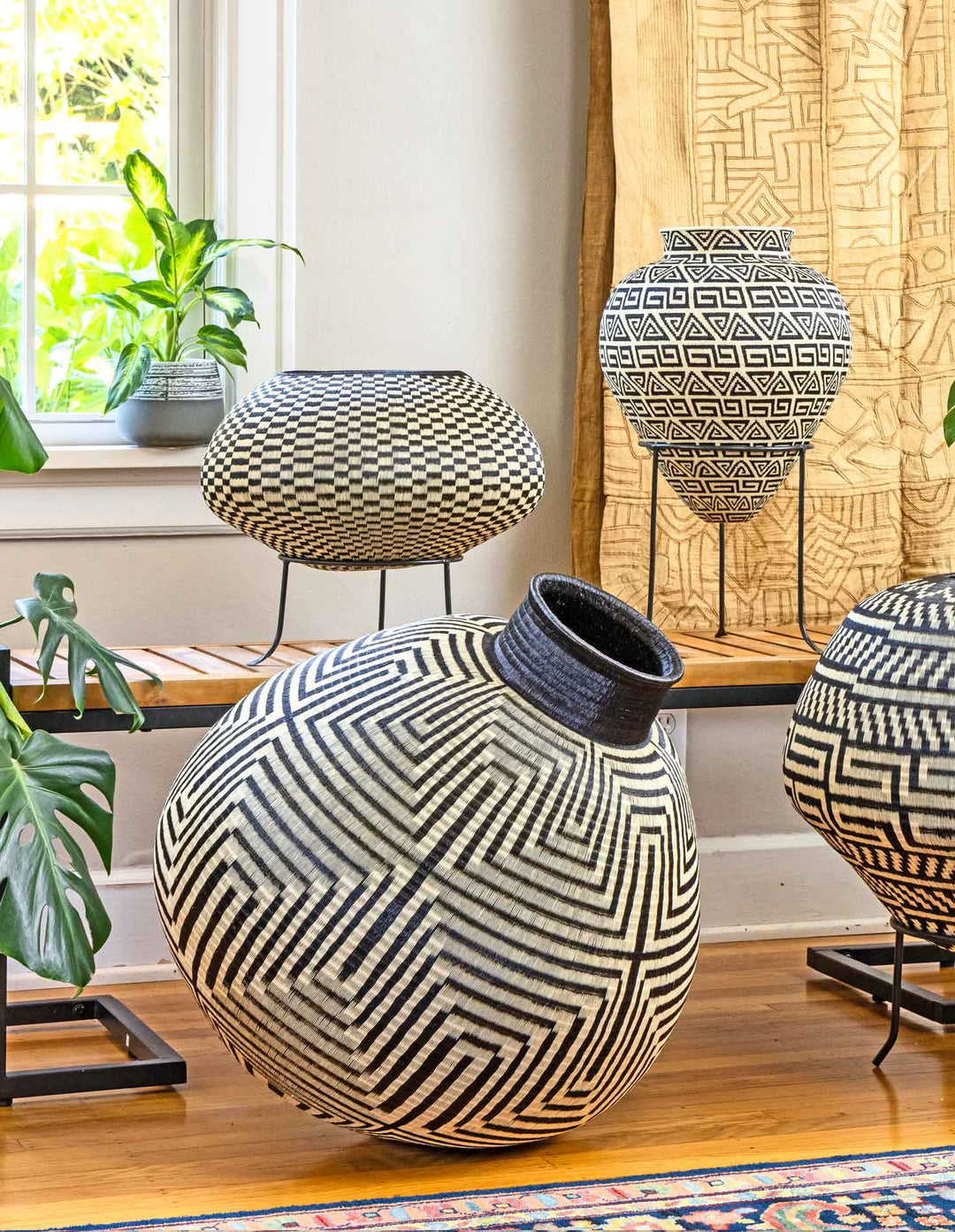 Global collection of handwoven baskets from Panama, Colombia, Rwanda, and Ghana, featuring Indigenous patterns and artisan craft from RFB Woven Art