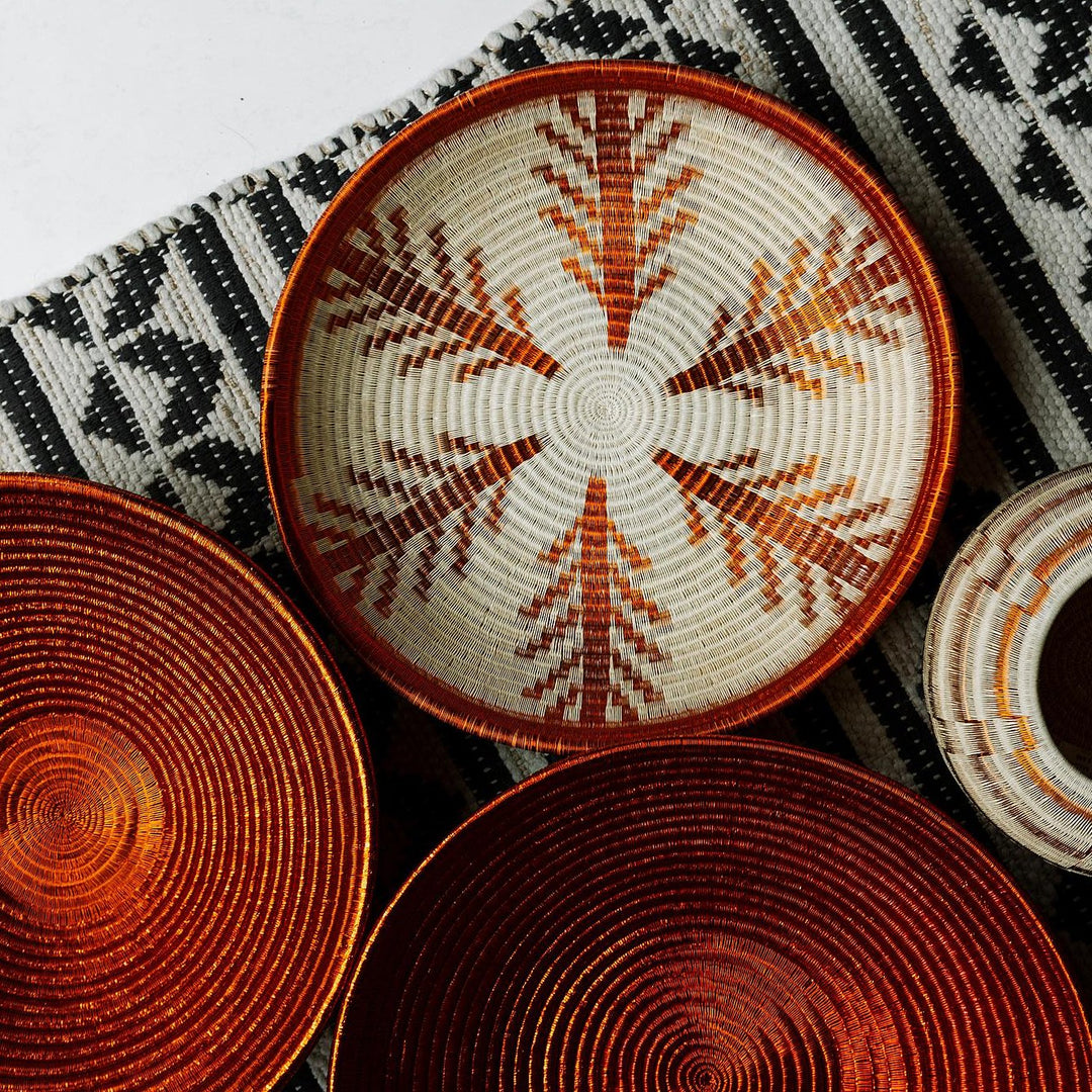 Decorative woven wall plates handmade by Indigenous artists in Panama and Colombia, featuring symbolic patterns and natural dyes — RFB Woven Art