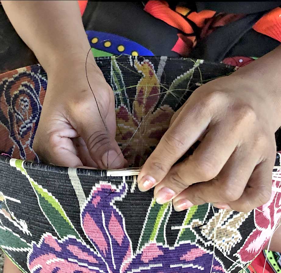 Handwoven basket and animal mask from RFB Woven Art’s reduced-price collection — unique Indigenous pieces marked down for easier purchase