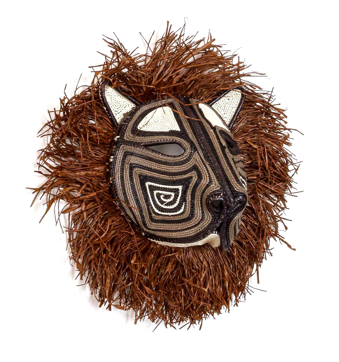 Wild Mane Cat Mask, 12" woven art by Embera weaver Felicinda Guaynora, Panama palm fiber feline mask with concentric designs and shaggy mane.