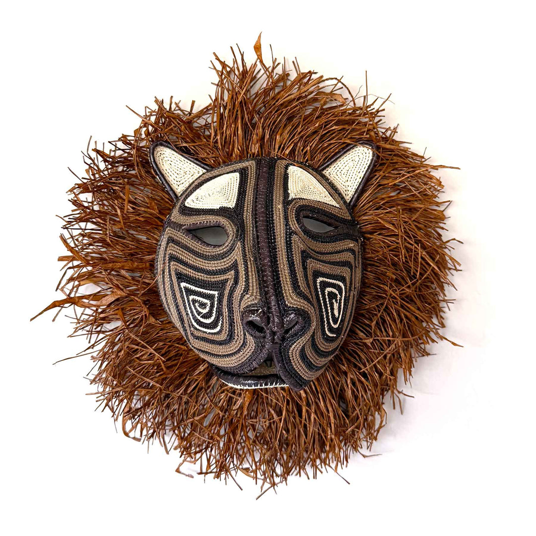Wild Mane Cat Mask front view, 12" woven art by Embera weaver Felicinda Guaynora, Panama palm fiber feline mask with concentric designs and shaggy mane.