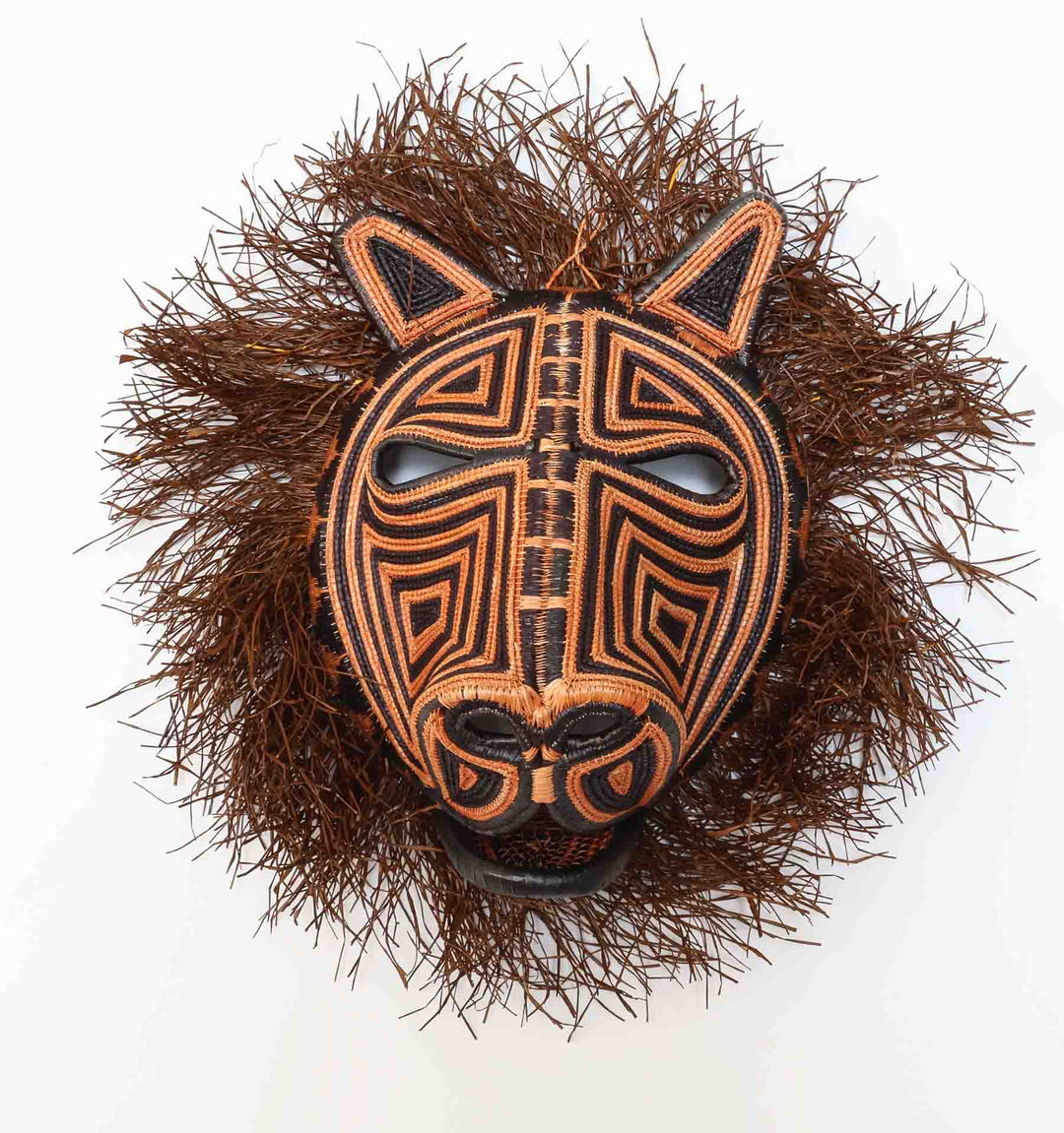 Firepath Cat Mask, 17" woven art by Embera weaver Felicinda Guaynora, Panama palm fiber cat mask in orange and black geometric designs with mane.