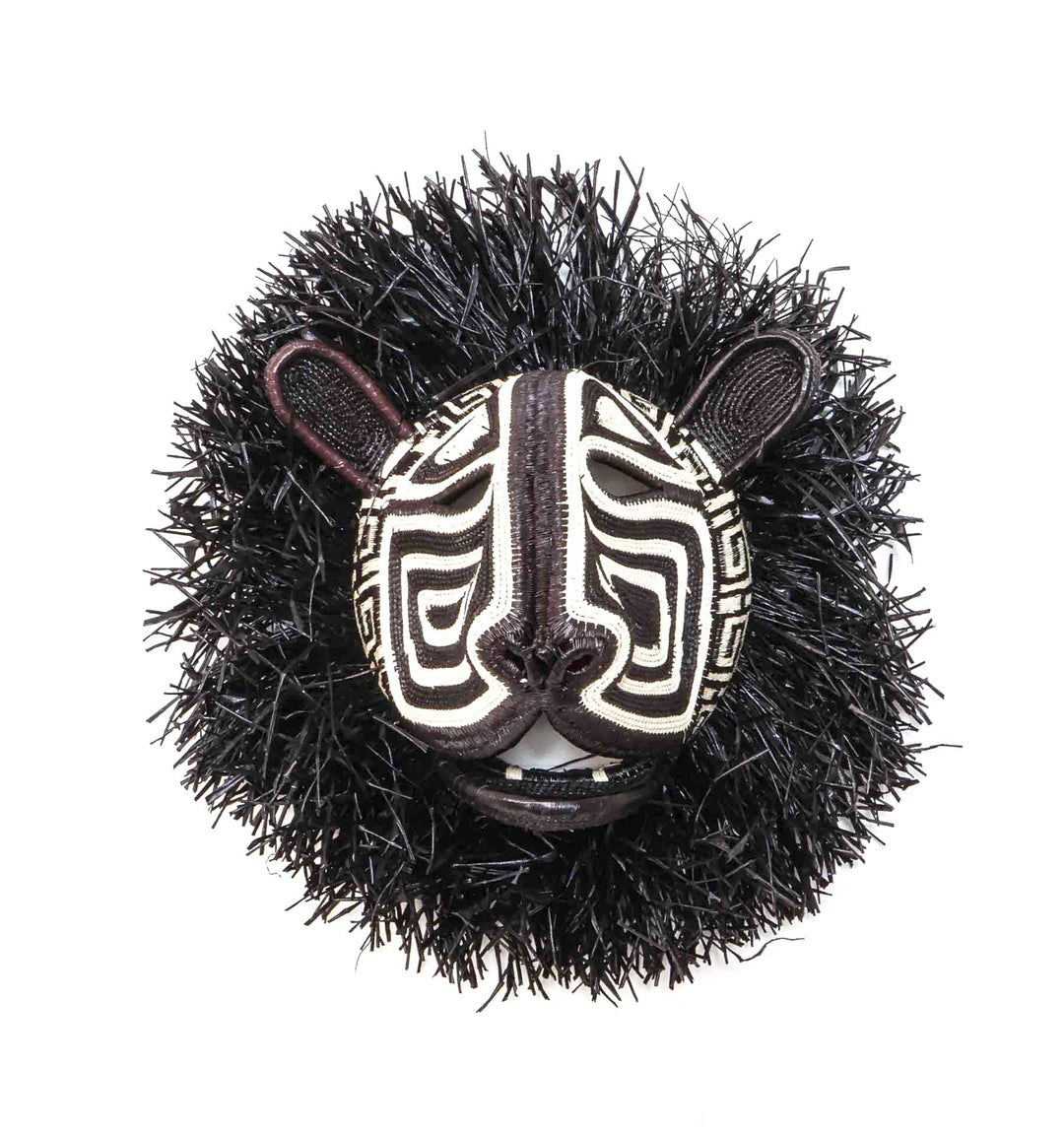 Handwoven Embera cat mask in black and ivory with wild palm mane, front view