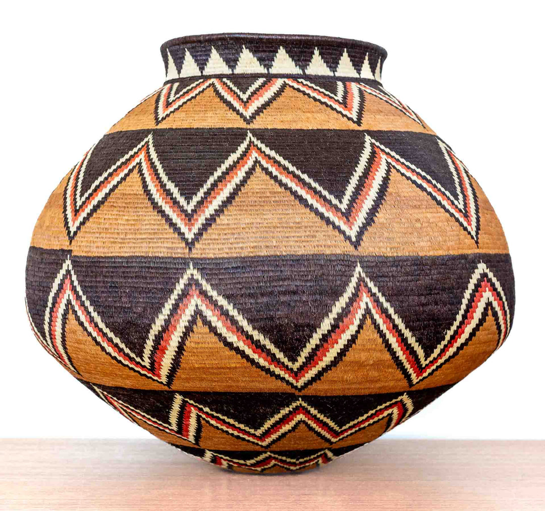 Full front view of Ember Sunburst Wounaan basket