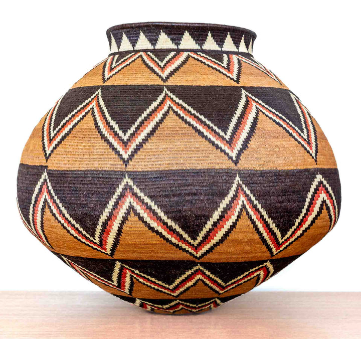 Full front view of Ember Sunburst Wounaan basket