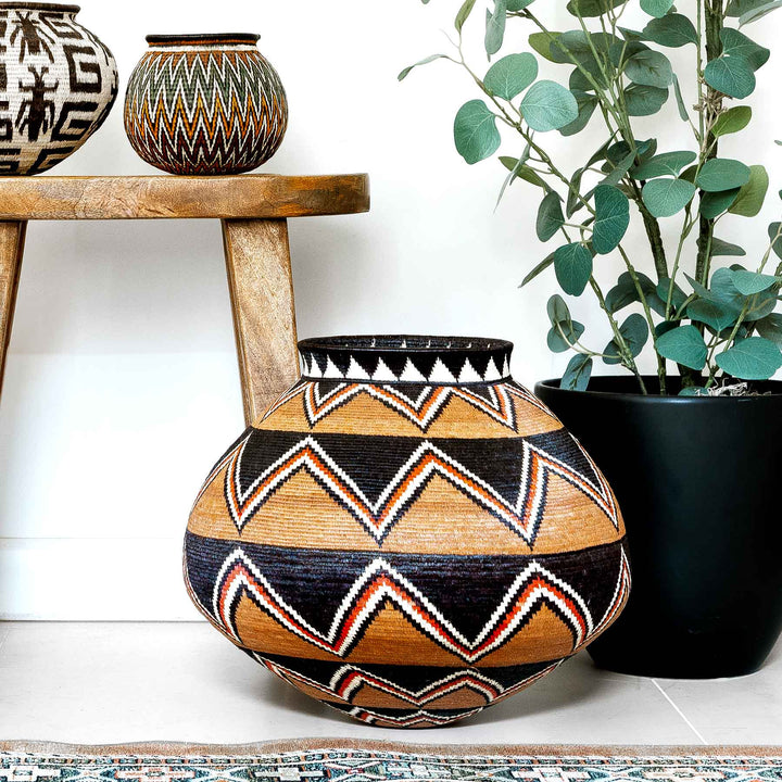 Full front view of Ember Sunburst Wounaan basket