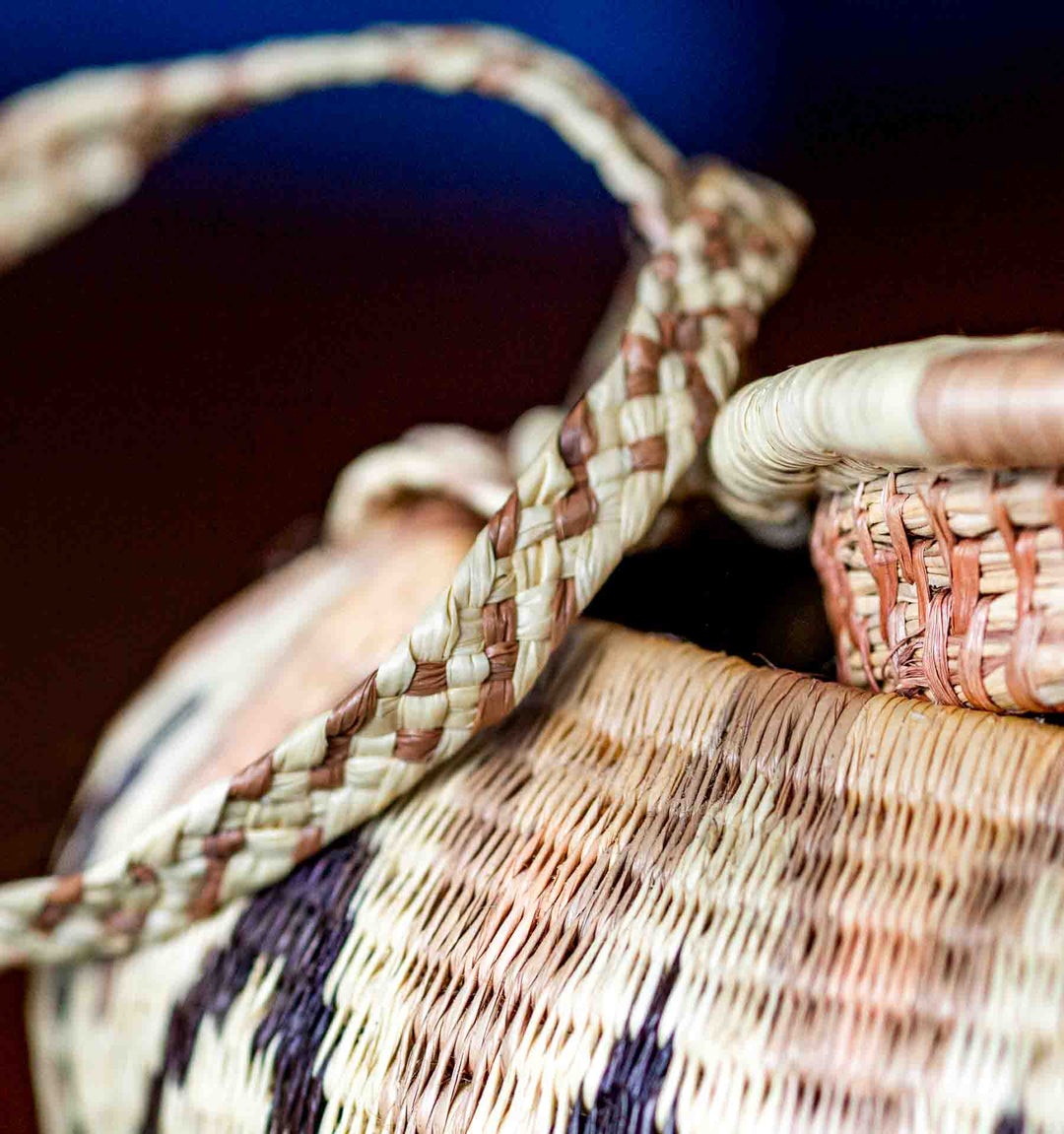 Open Wounaan basket purse showing woven lid and strap, Panama